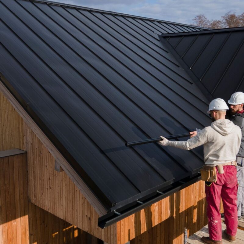 roofers working together with helmets