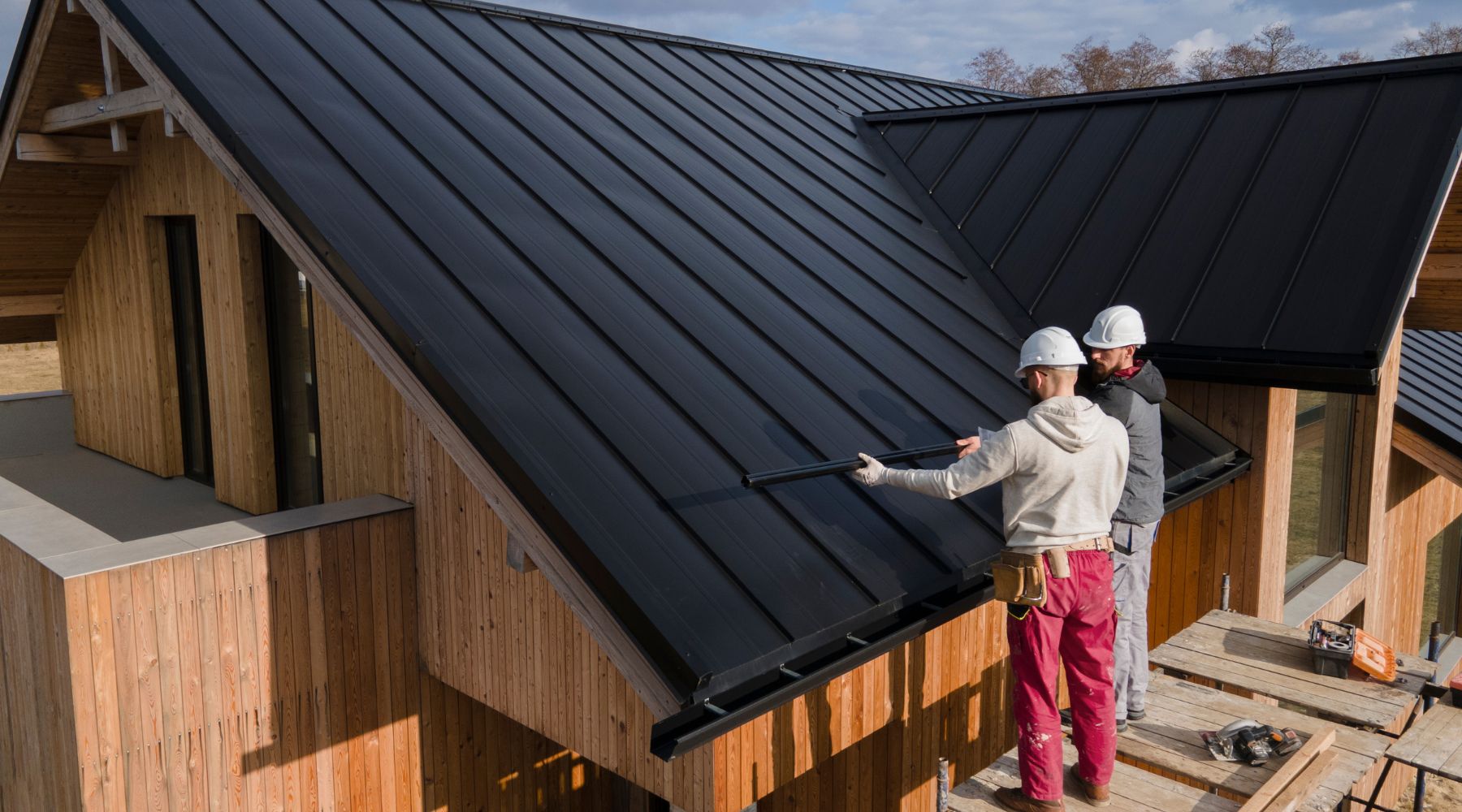 roofers working together with helmets